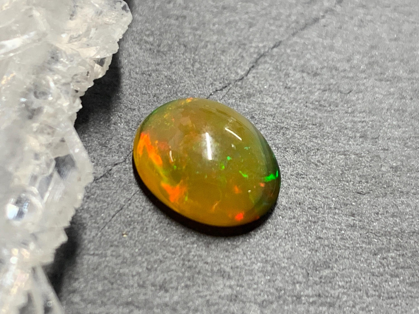 Natural Black Ethiopian Opal oval 9x11x4mm cabochon