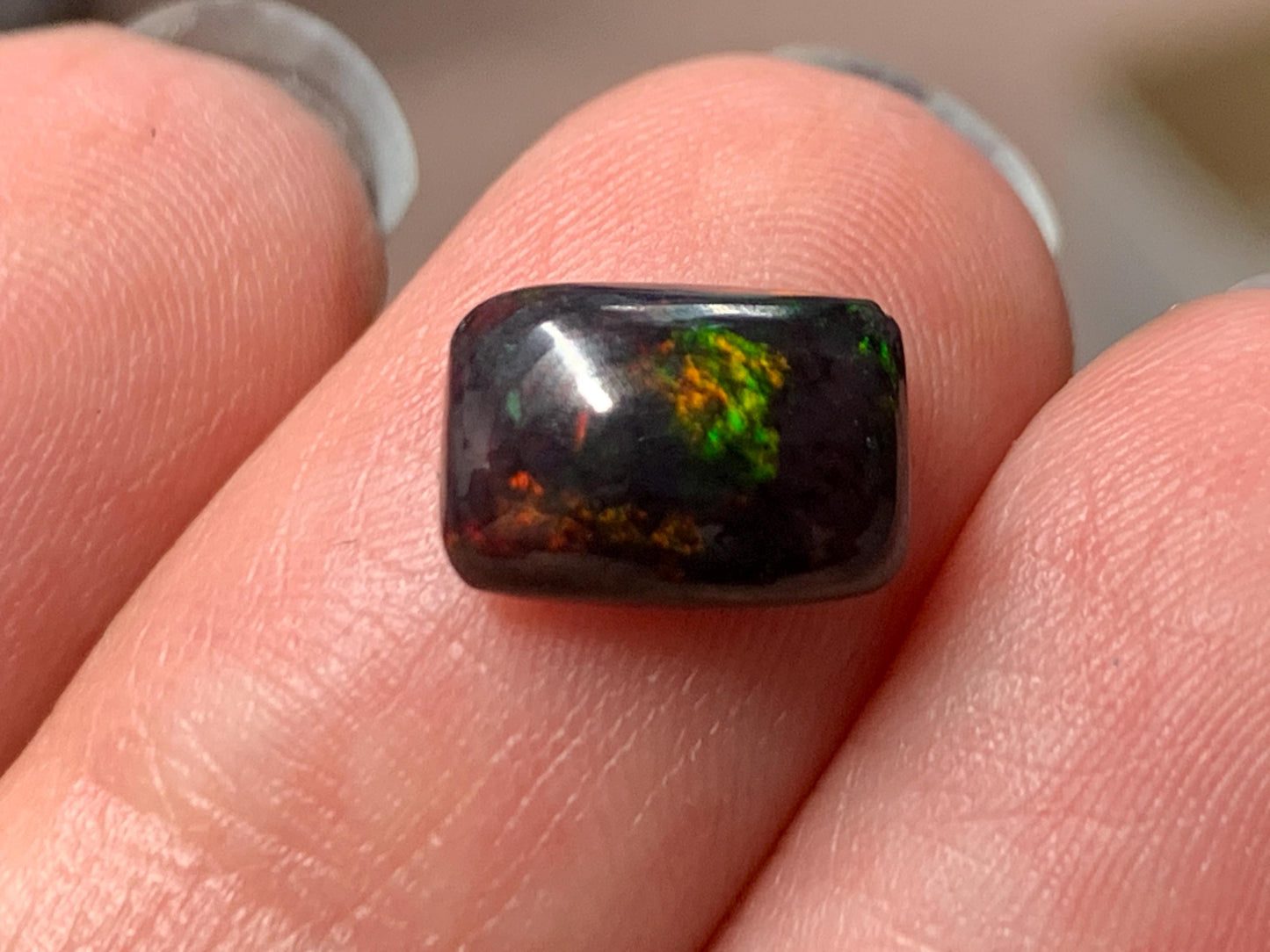 Natural Ethiopian Black Opal 6x9x3mm cabochon