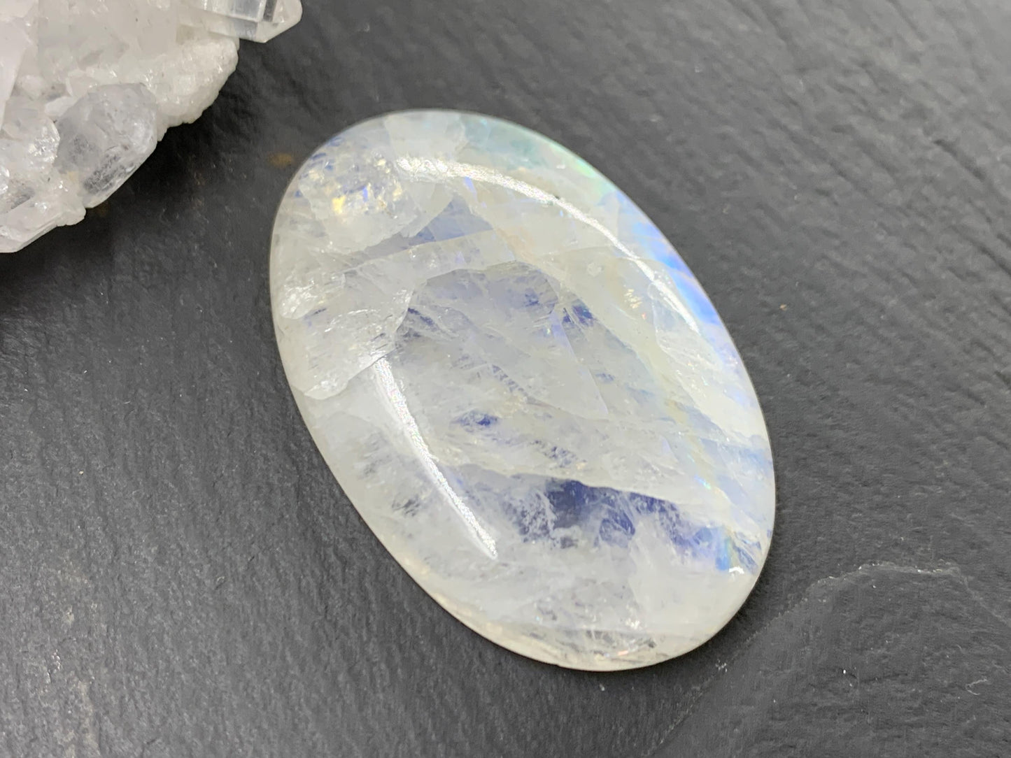 Rainbow Moonstone oval 38x25x7mm cabochon