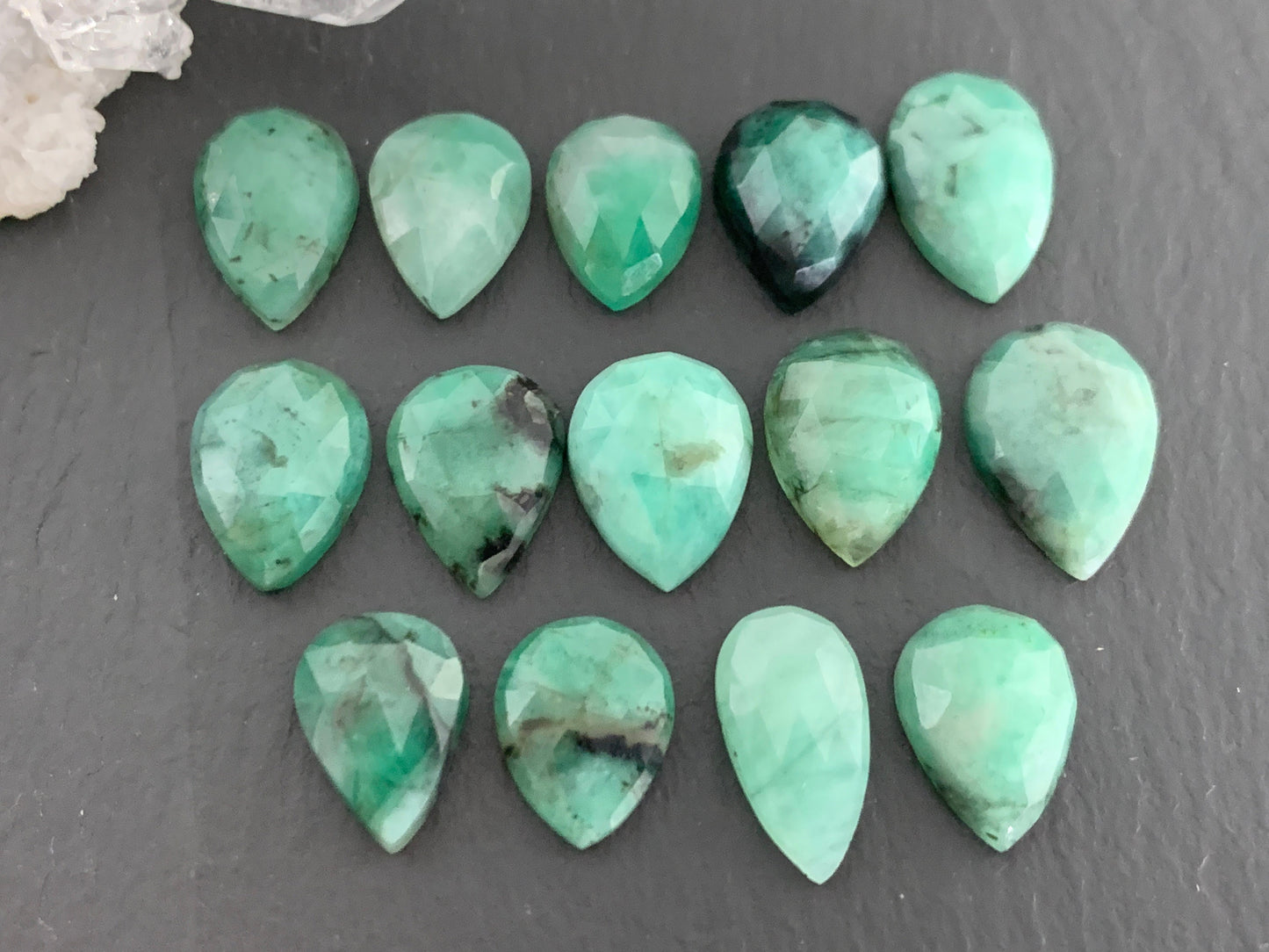 Faceted Emerald pear 11-13mm long cabochon