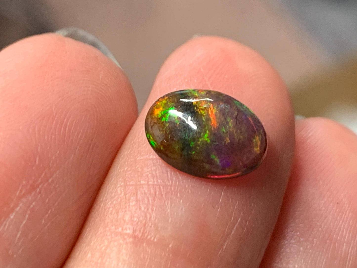 Natural Ethiopian Black Opal 7x10x3mm cabochon