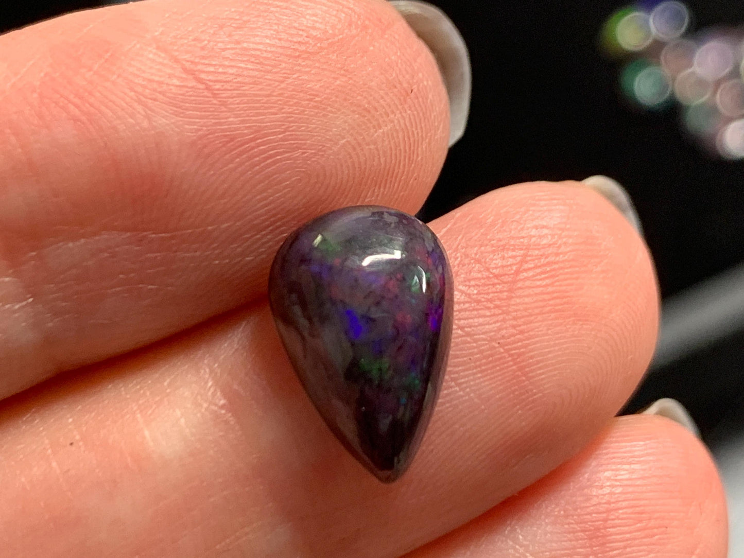 Natural Ethiopian Black Opal 8x13x4mm cabochon