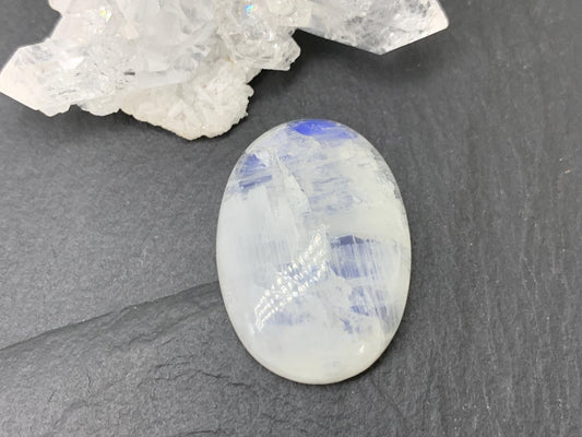 Rainbow Moonstone oval 26x19x7mm cabochon