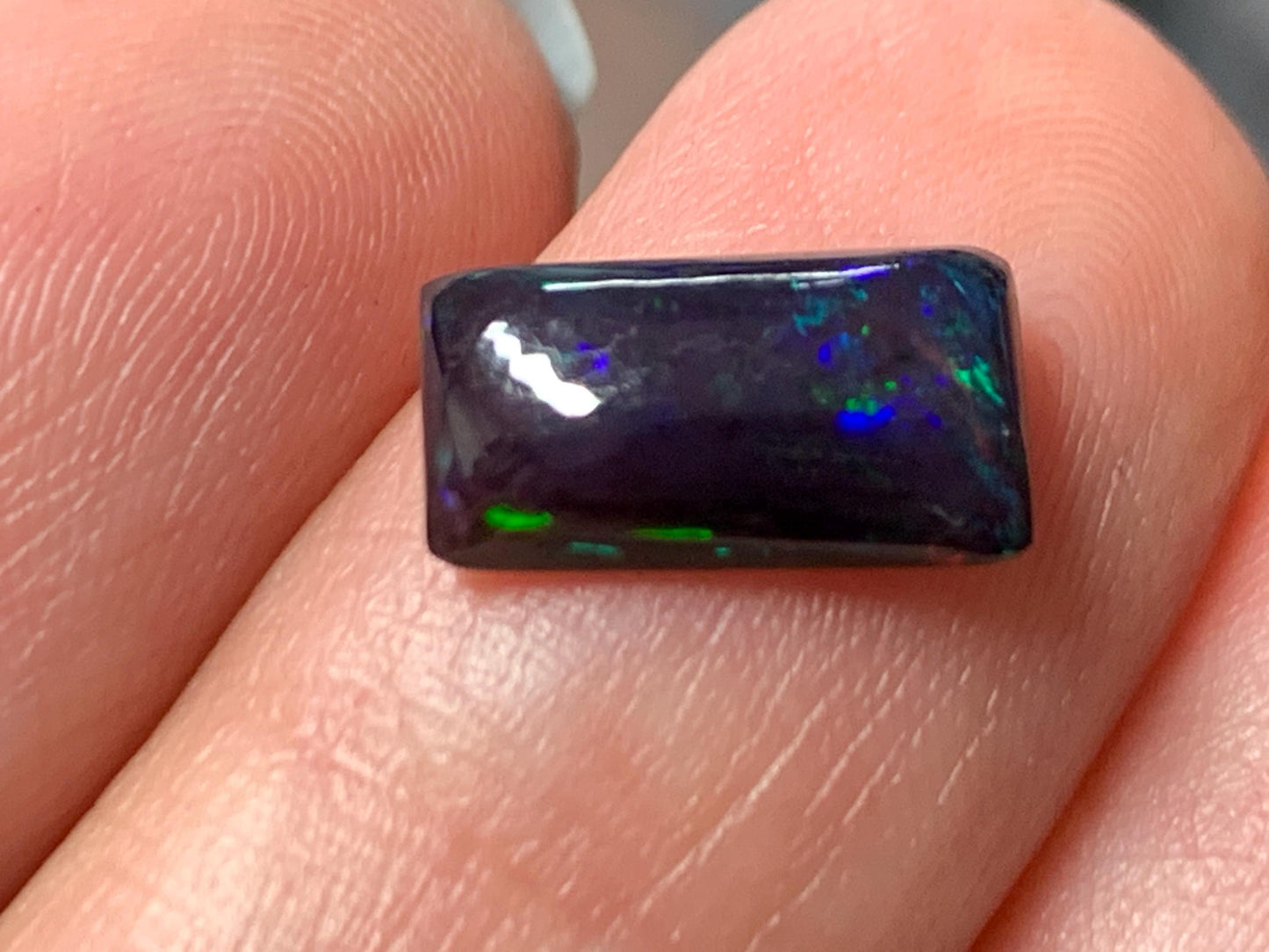 Natural Ethiopian Black Opal 6x11x3mm cabochon