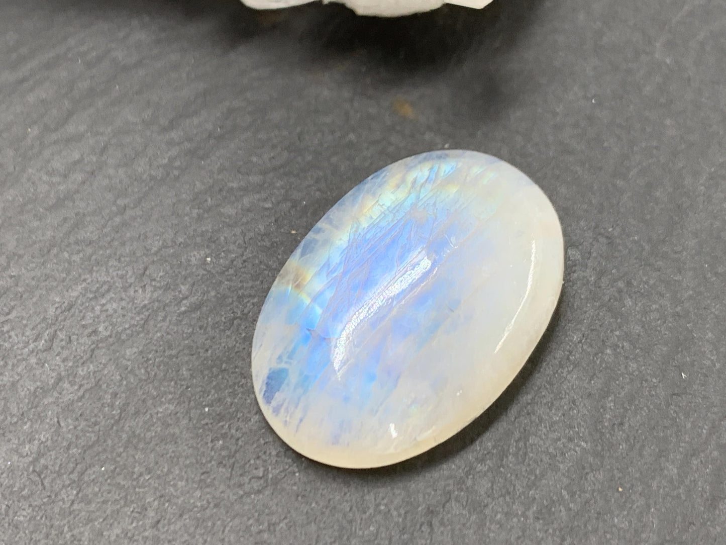 Rainbow Moonstone oval 22x15x6mm cabochon