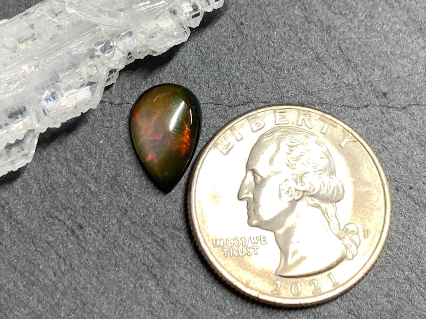 Natural Black Ethiopian Opal pear 8x13x4mm cabochon