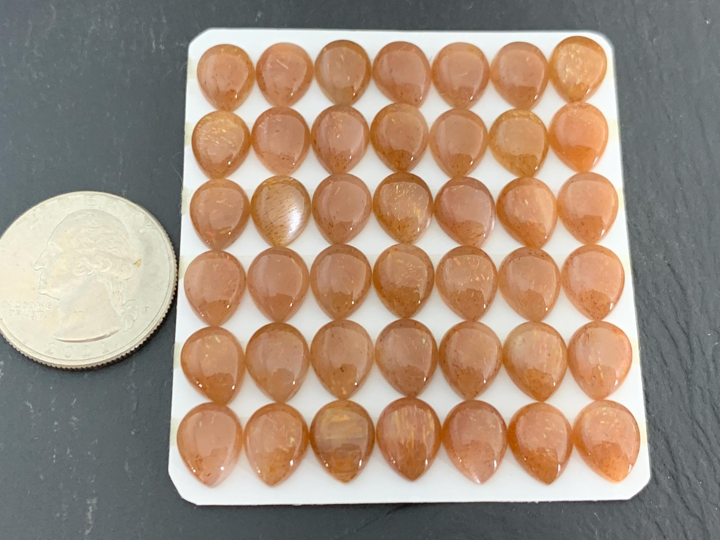 Gold Sunstone pear 8x10mm cabochon