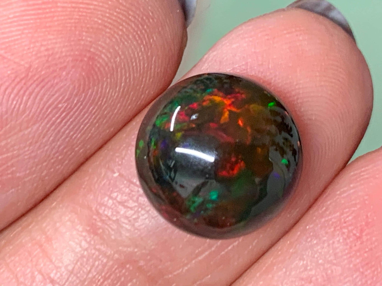 Natural Ethiopian Black Opal 12x5mm cabochon