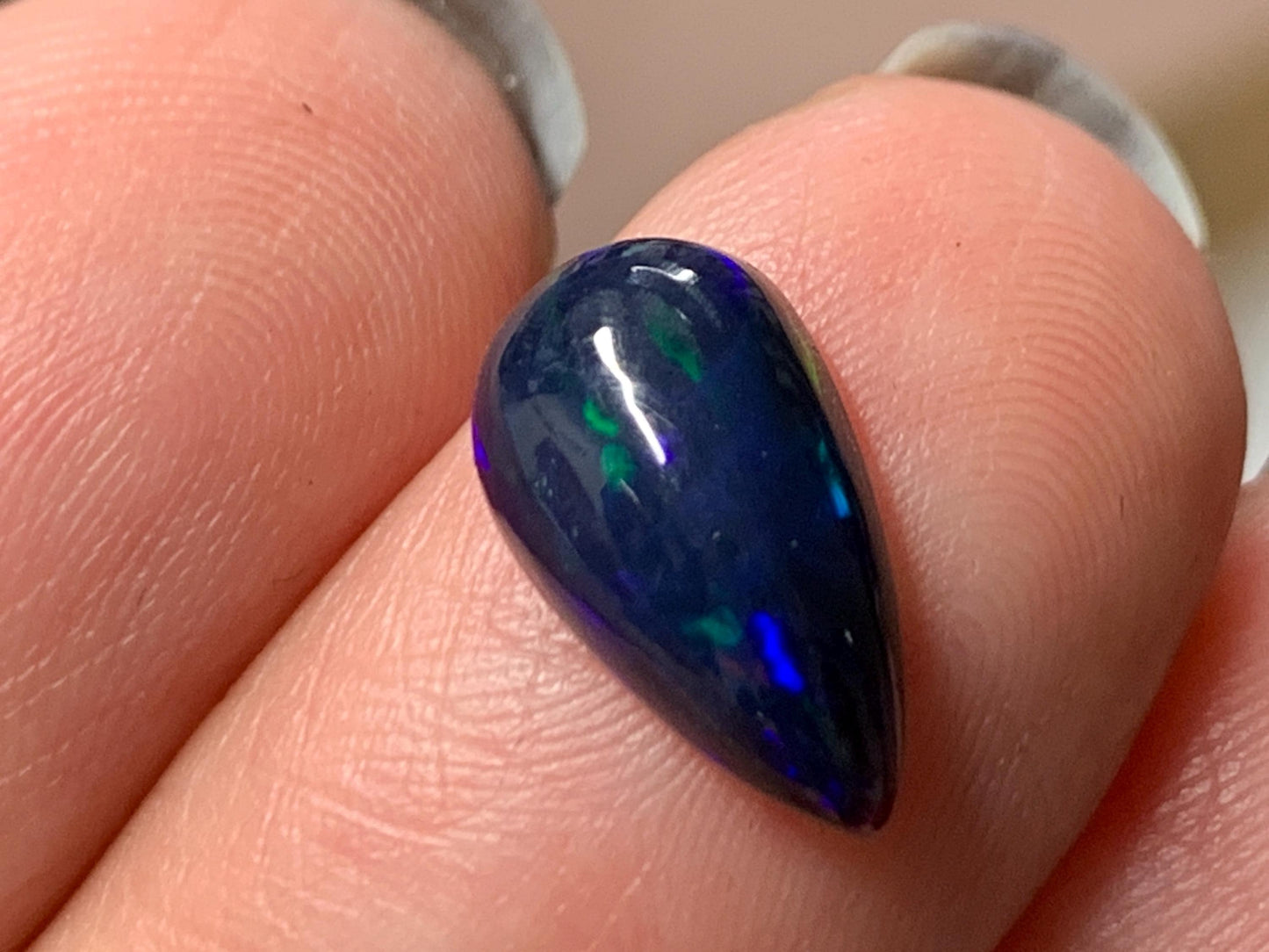 Natural Ethiopian Black Opal 7x12x4mm cabochon