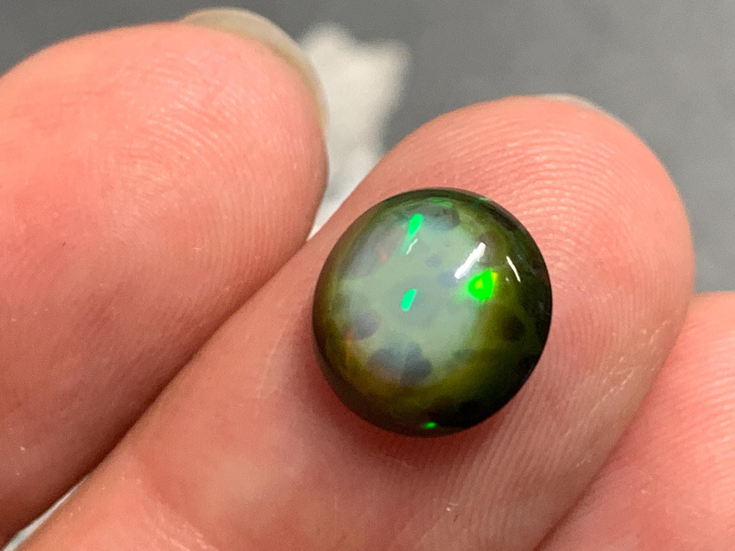 Natural Black Ethiopian Opal round 9.5x9.5x4mm cabochon