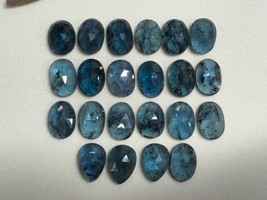 Faceted Moss Kyanite pear, oval 10x14mm cabochon