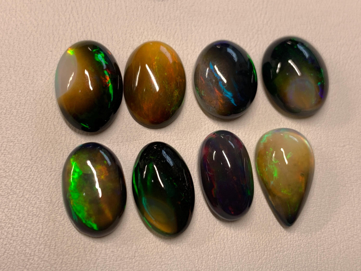 Natural Ethiopian Black Opal oval, pear 13-15mm long cabochon