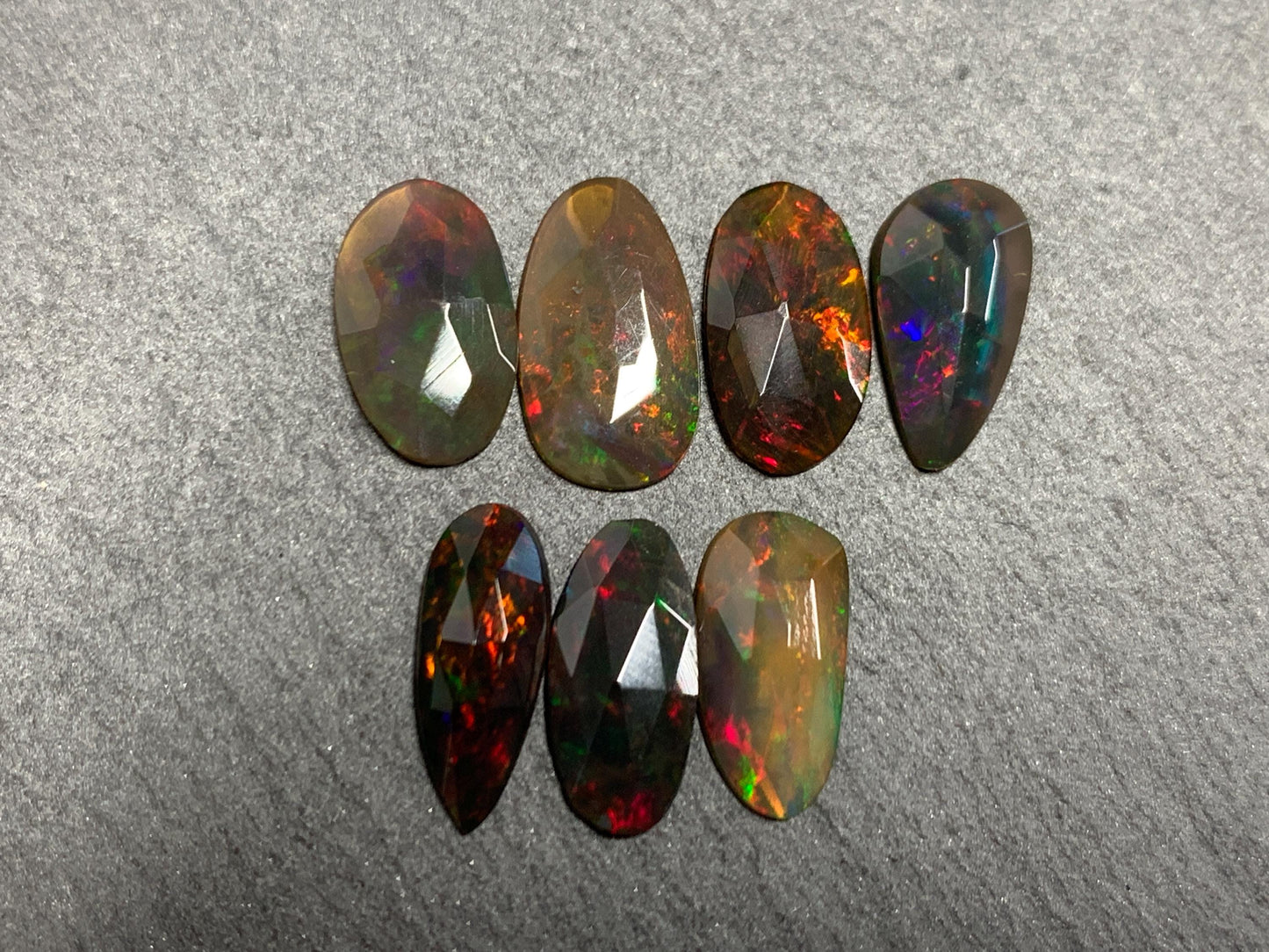 Faceted Black Ethiopian Opal 11-12mm long cabochon