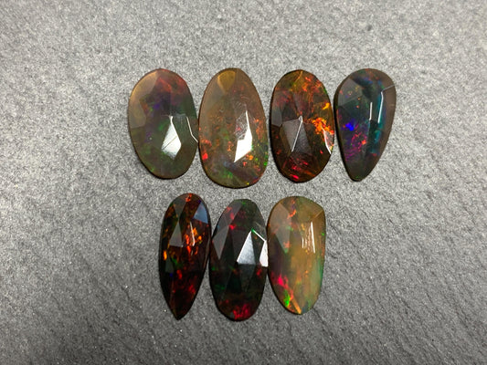 Faceted Black Ethiopian Opal 11-12mm long cabochon