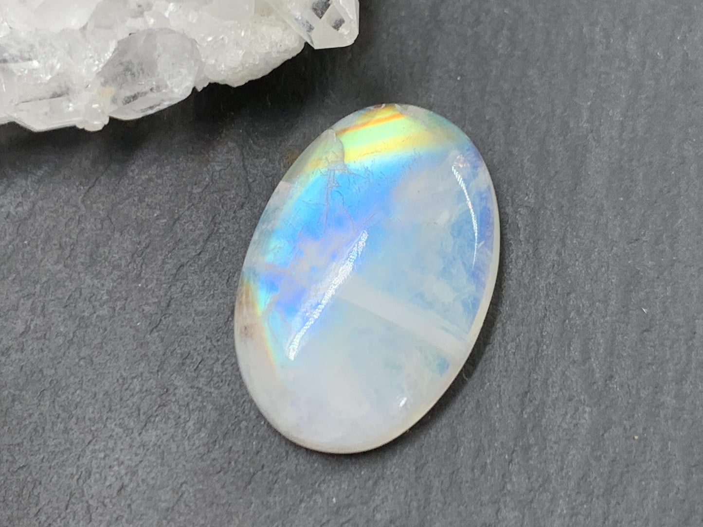 Rainbow Moonstone oval 23x16x6mm cabochon