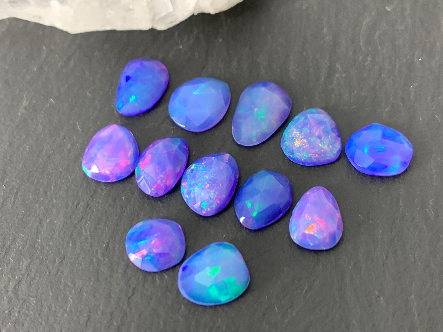Faceted Purple Ethiopian Opal 7-9mm cabochon