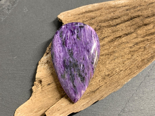 Charoite pear 50x30x7mm cabochon