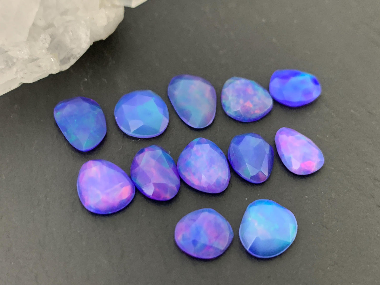 Faceted Purple Ethiopian Opal 7-9mm cabochon