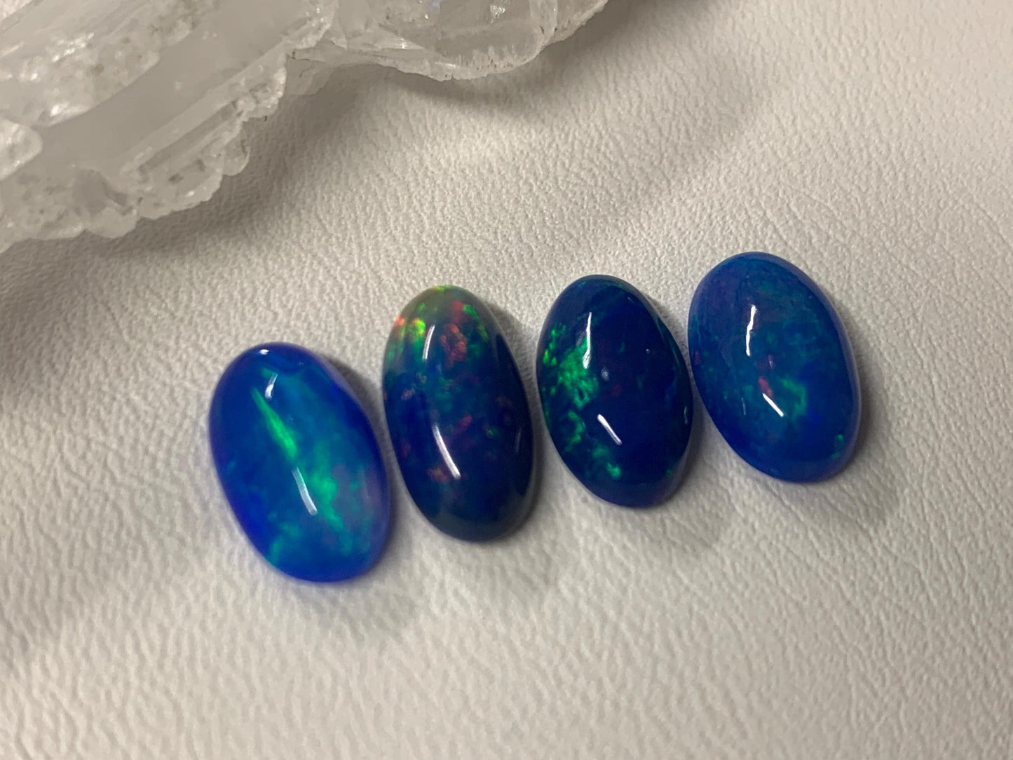 Ethiopian Opal oval 11-12mm long cabochon - Natural Opal smoked to blue color
