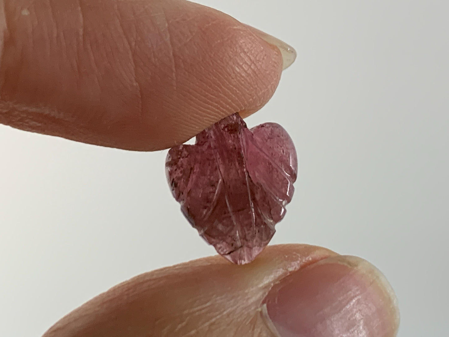 Carved Tourmaline 10x12x4mm cabochon