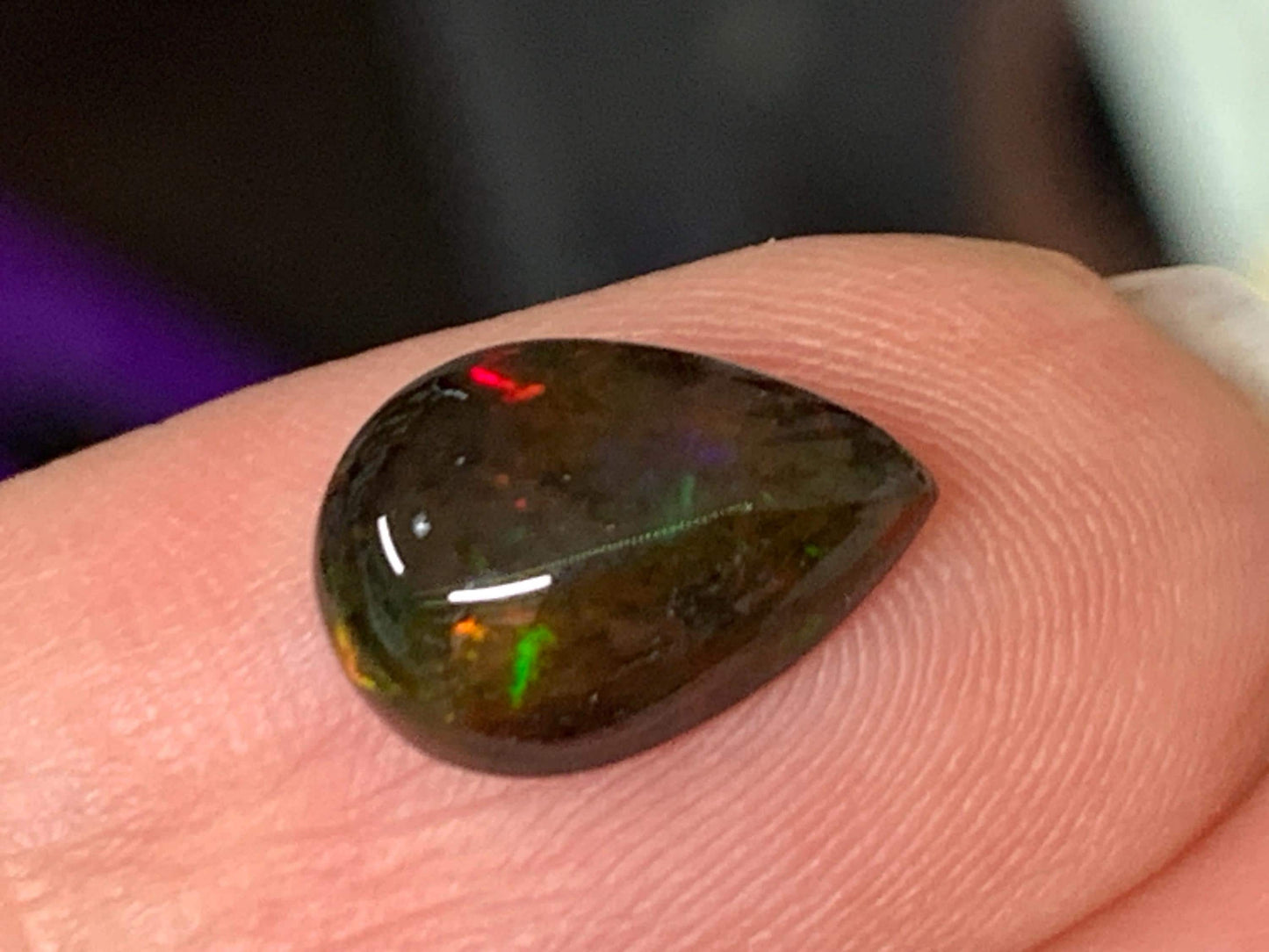 Natural Ethiopian Black Opal 7x11x3.5mm cabochon