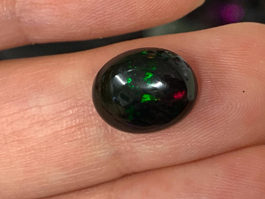 Natural Ethiopian Black Opal 9x12x5mm cabochon