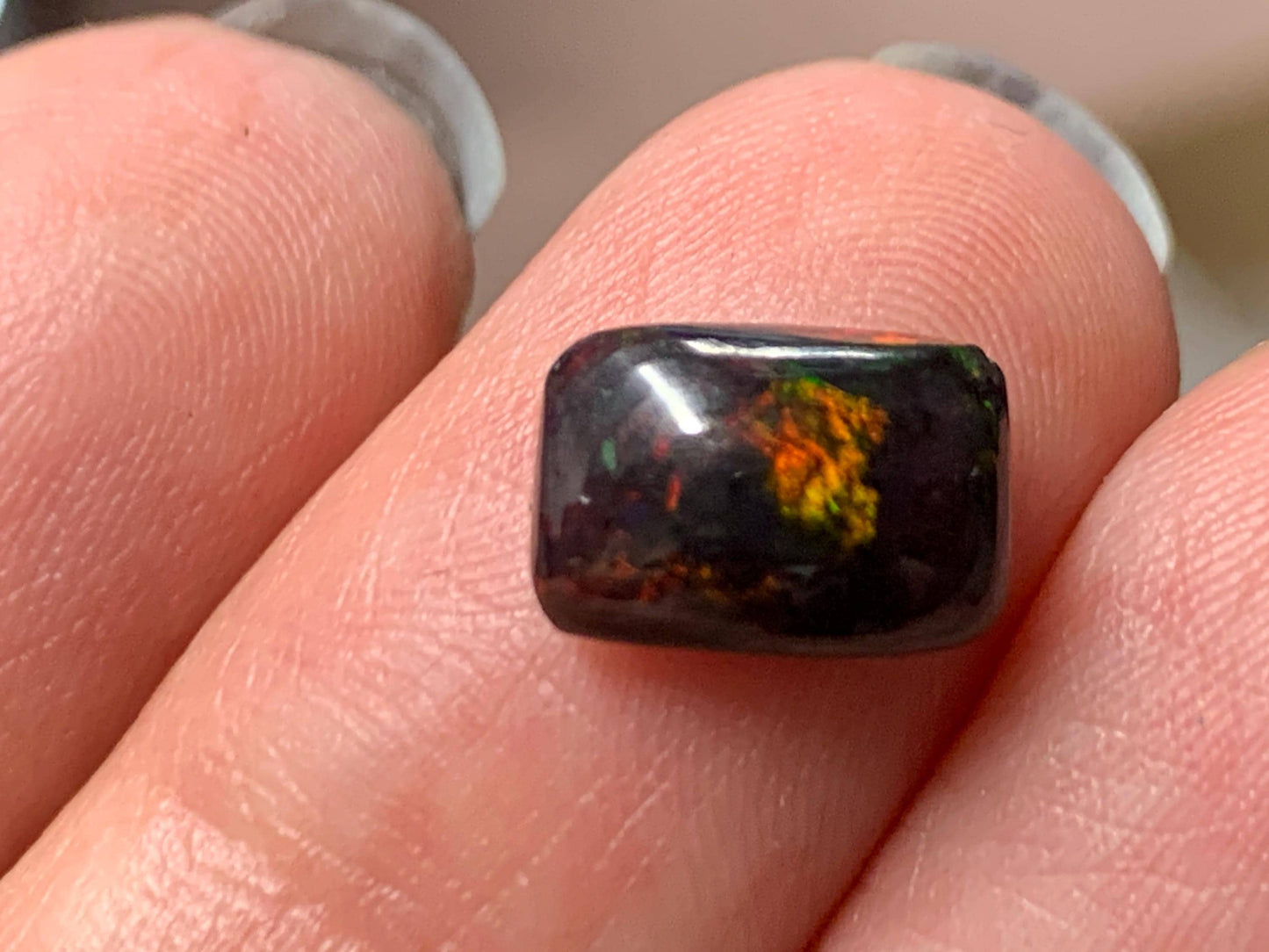 Natural Ethiopian Black Opal 6x9x3mm cabochon