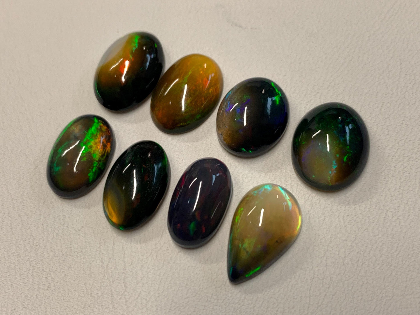 Natural Ethiopian Black Opal oval, pear 13-15mm long cabochon