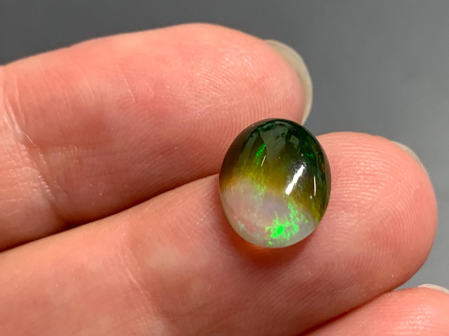 Natural Black Ethiopian Opal oval 9x11x4mm cabochon