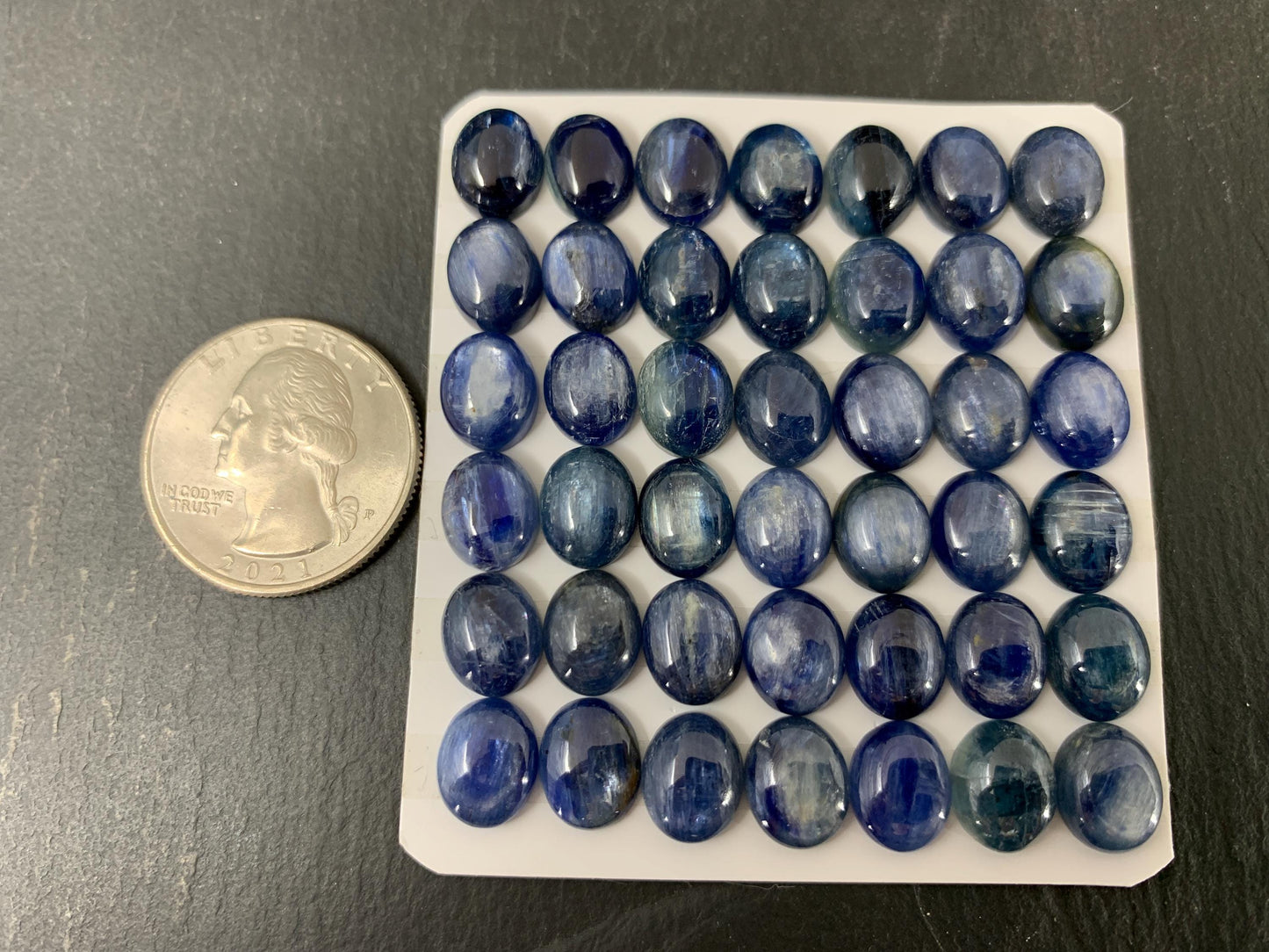 Kyanite oval cabochon 8x10mm - Calibrated cabochons.