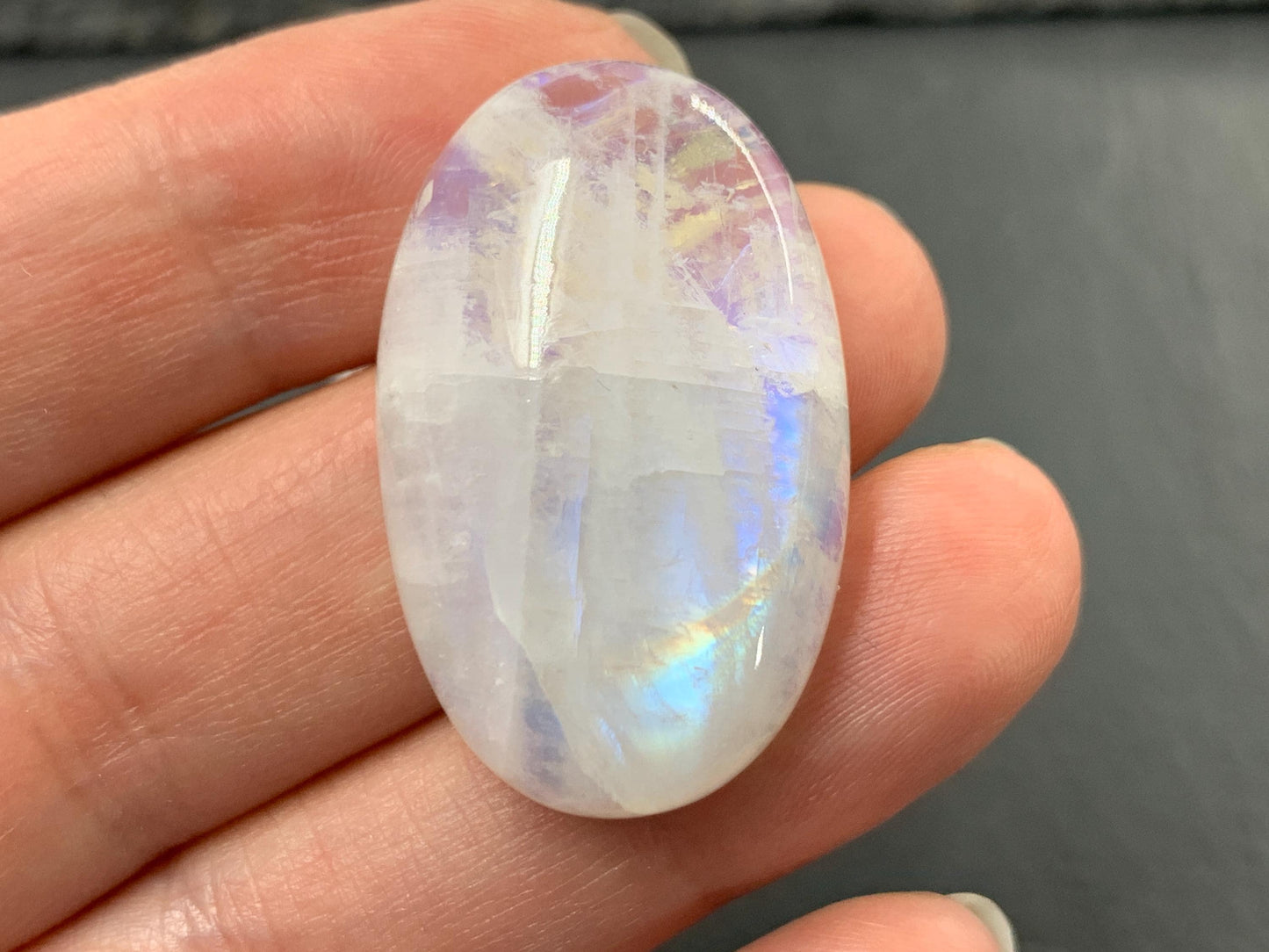 Rainbow Moonstone oval 33x21x9mm cabochon