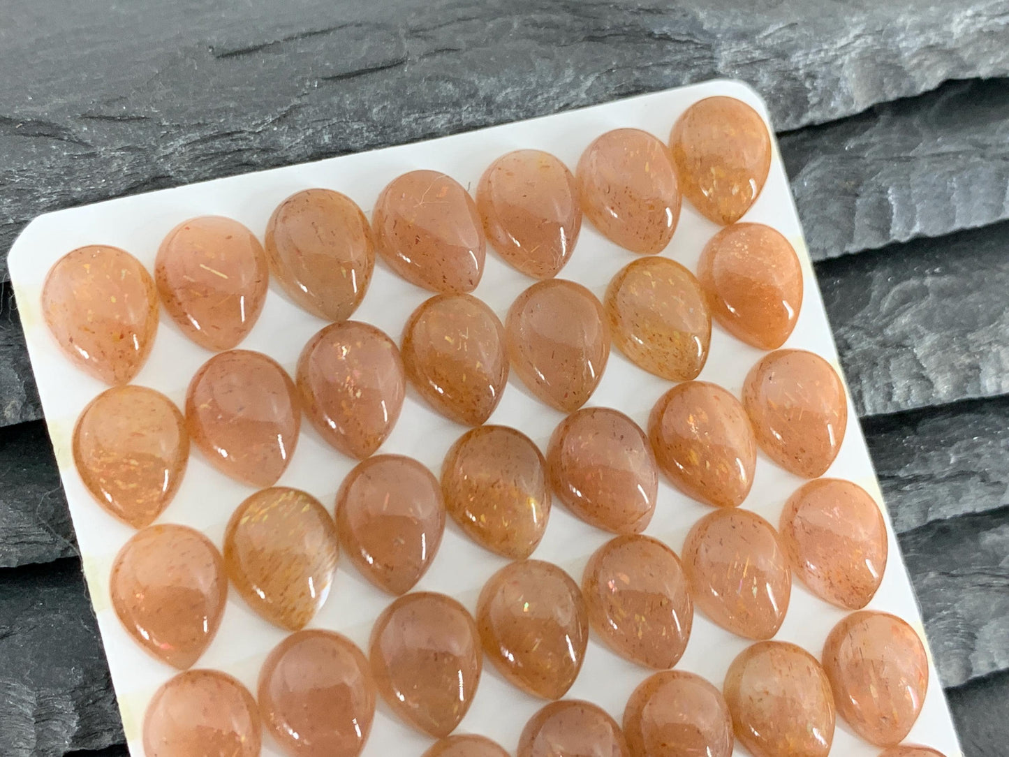 Gold Sunstone pear 8x10mm cabochon