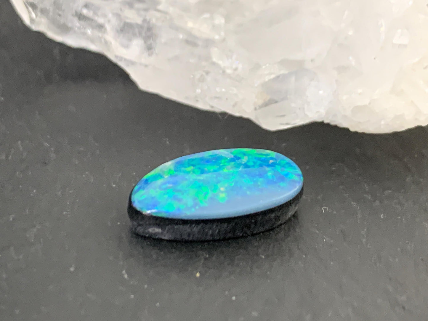 Australian Opal doublet 8x14x4mm cabochon