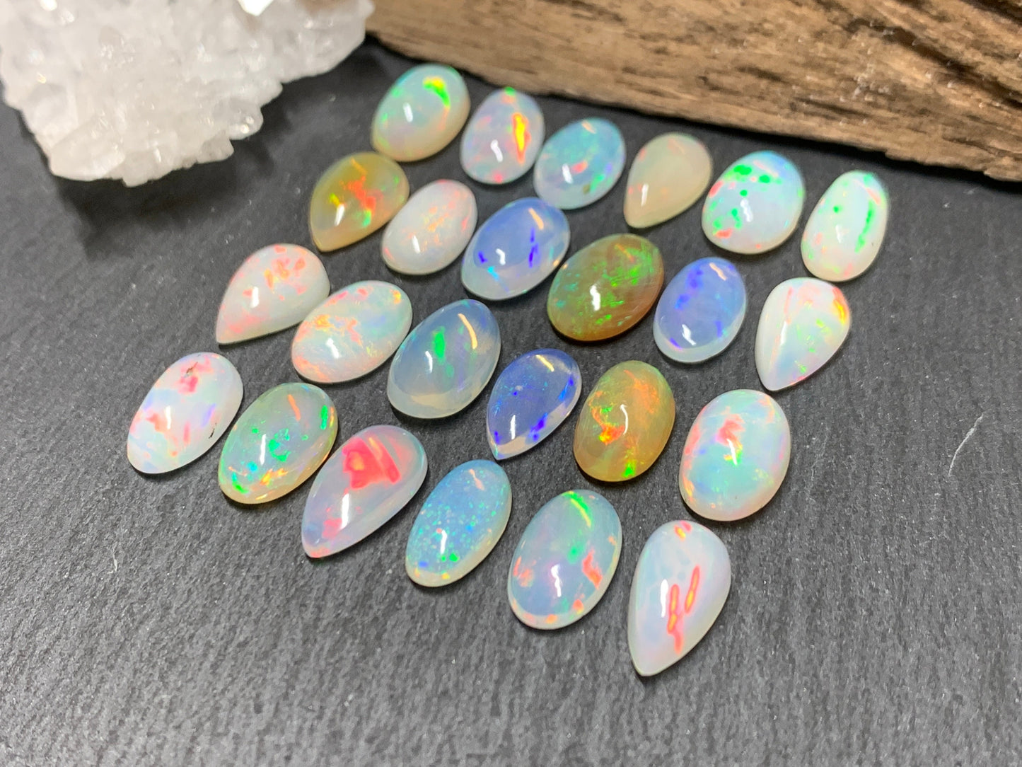 Ethiopian Opal pear, oval 11-12mm long cabochon