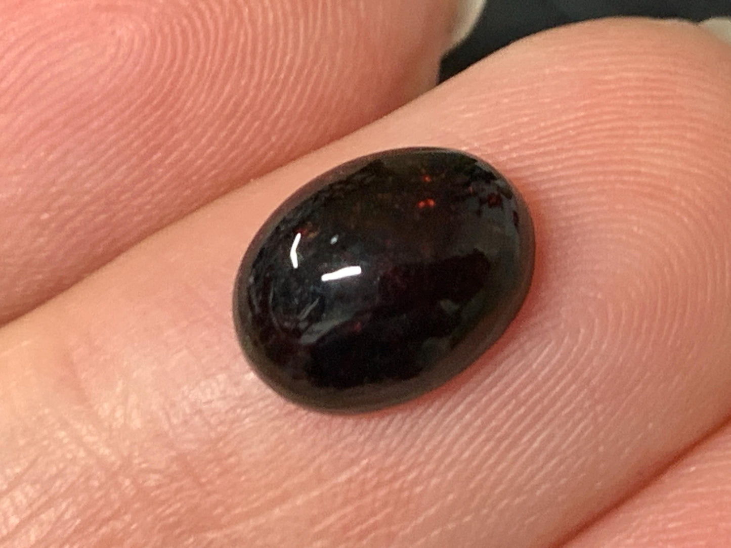 Natural Ethiopian Black Opal 7x9x4mm cabochon