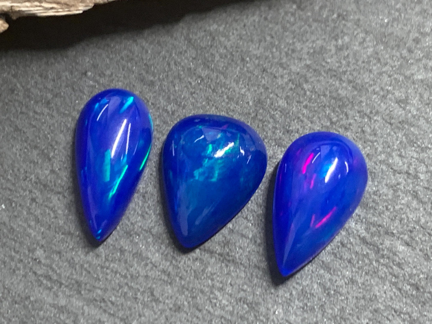 Ethiopian Opal pear 11-13mm long cabochon - Natural Opal smoked to blue color