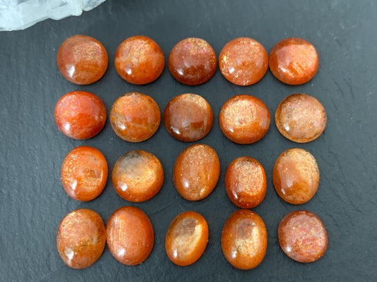 Sunstone round, oval 9-10mm long cabochon