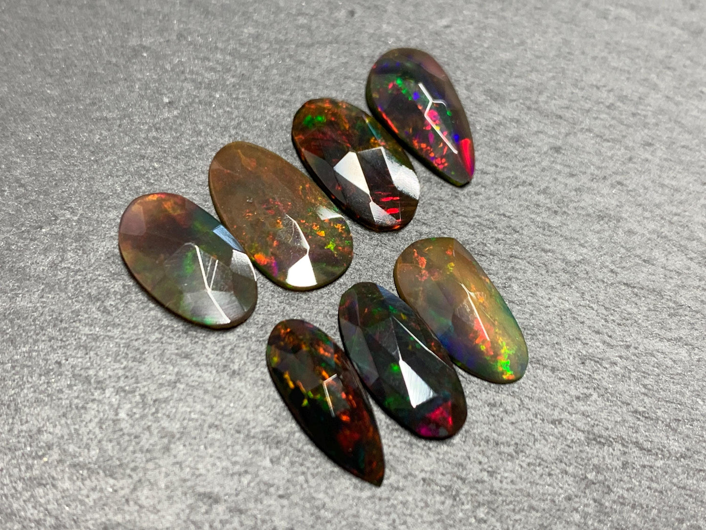 Faceted Black Ethiopian Opal 11-12mm long cabochon