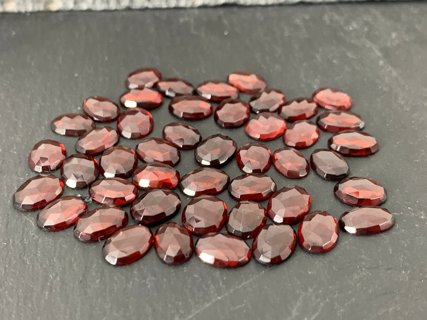 Faceted Mozambique Garnet 8-9.5mm long oval Cabochon