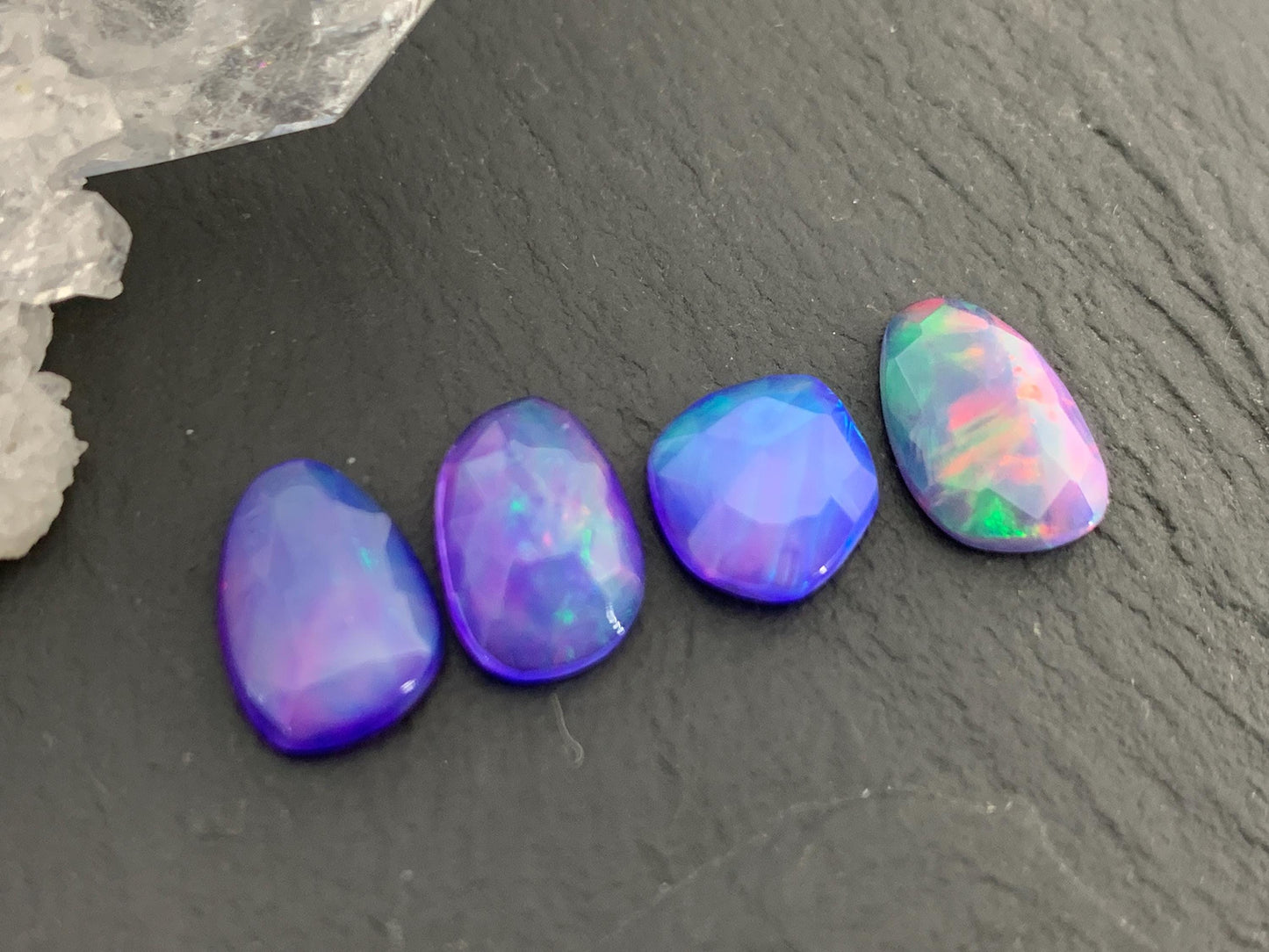 Faceted Ethiopian Purple Opal 9-11mm cabochon