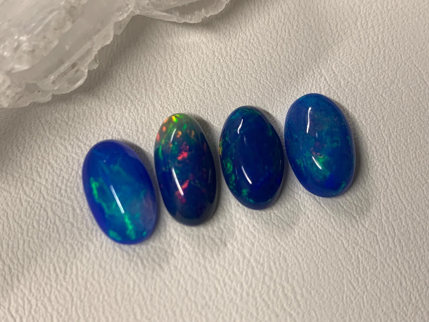 Ethiopian Opal oval 11-12mm long cabochon - Natural Opal smoked to blue color