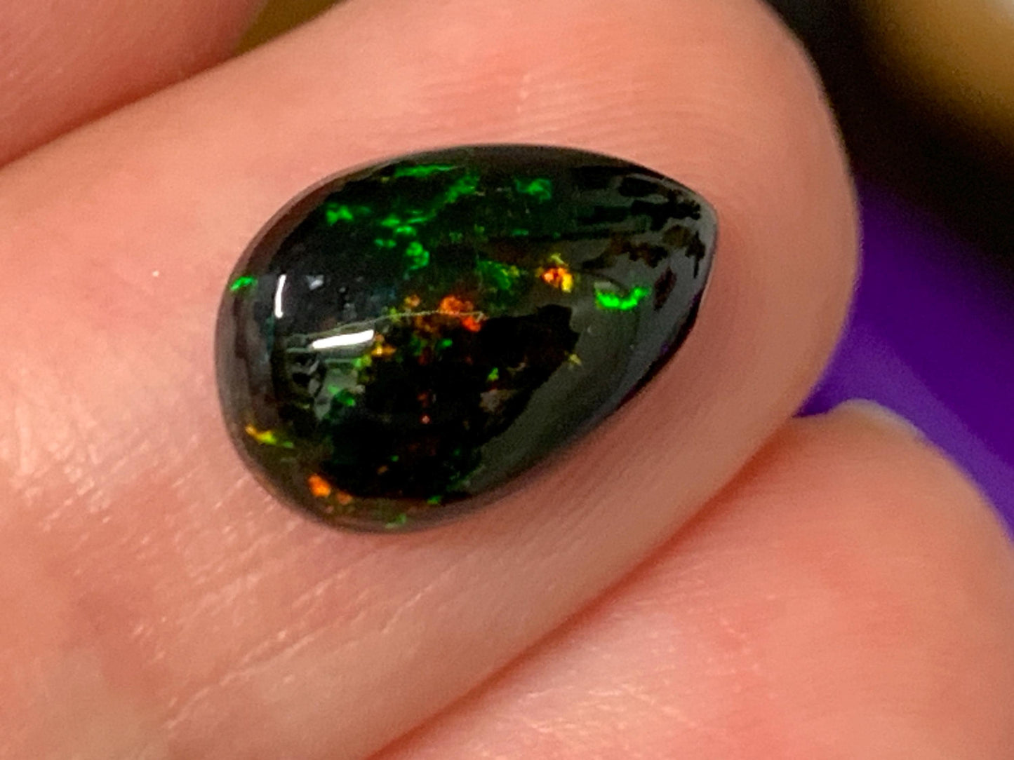 Natural Ethiopian Black Opal 8x12x4mm cabochon