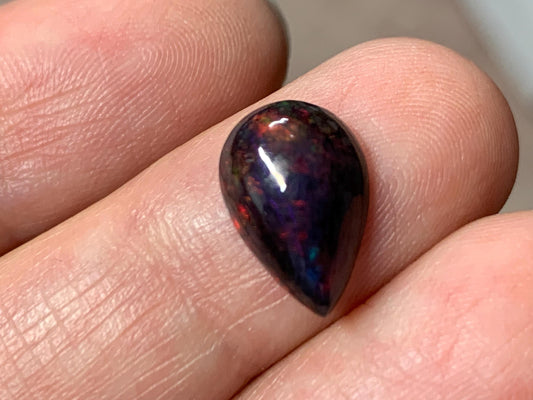 Black Ethiopian Opal pear 8x13x4mm cabochon