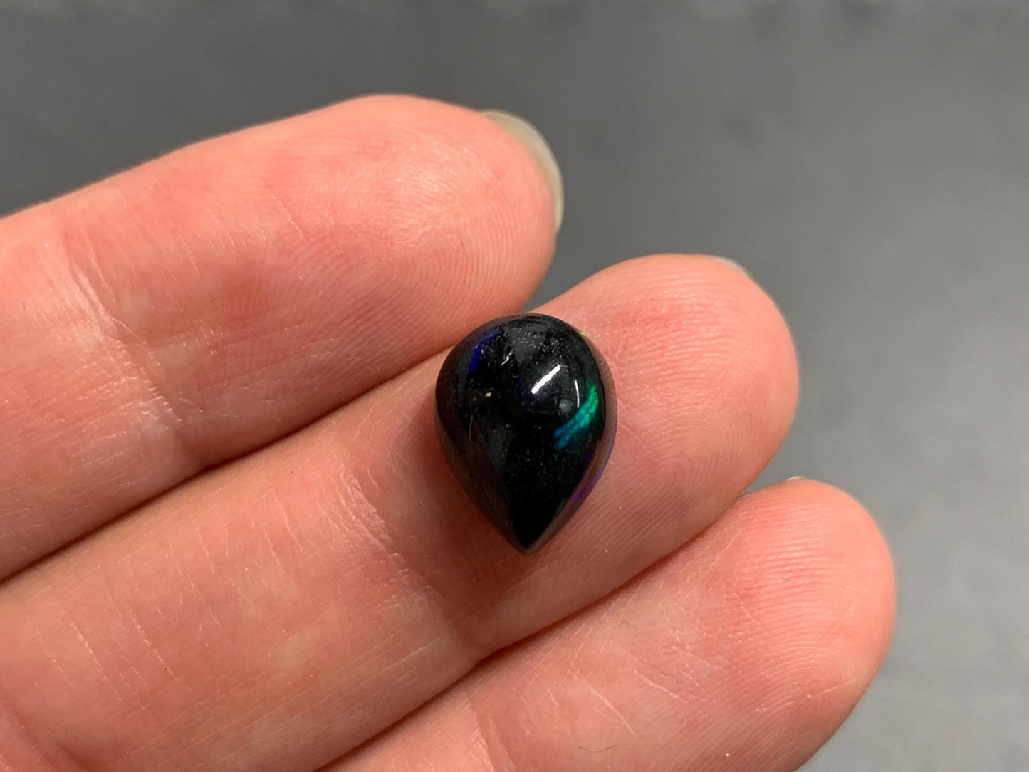 Natural Black Ethiopian Opal pear 9x12x6mm cabochon