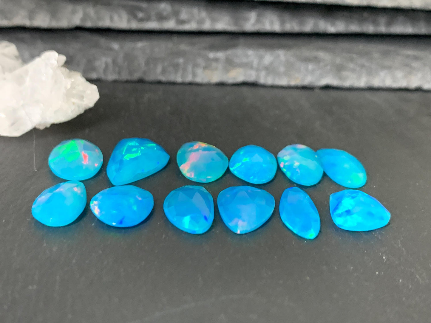 Faceted Blue Ethiopian Opal 11-16mm long cabochon