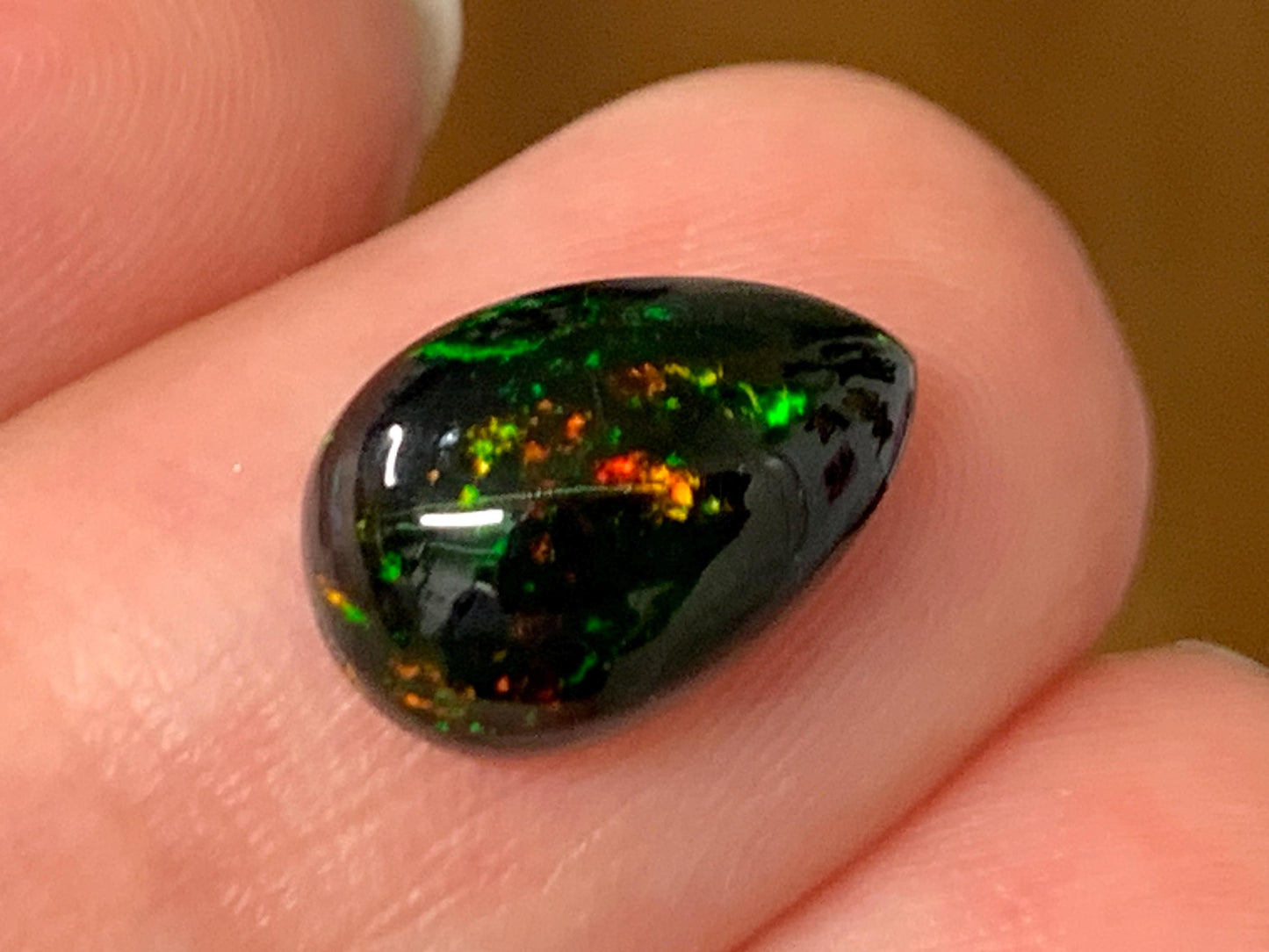Natural Ethiopian Black Opal 8x12x4mm cabochon