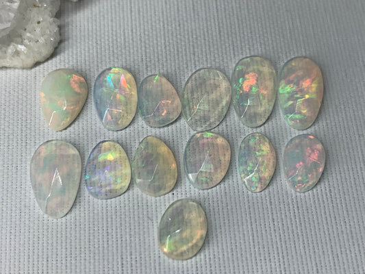 Faceted Ethiopian Opal 8-11mm cabochon