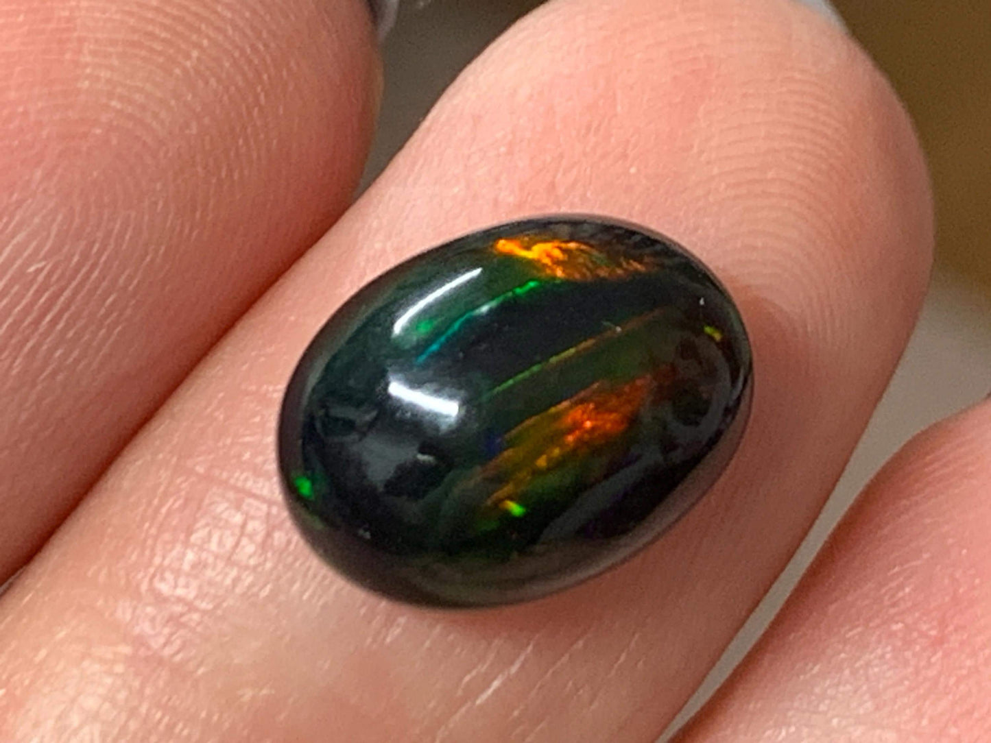 Natural Ethiopian Black Opal 9x12x5mm cabochon