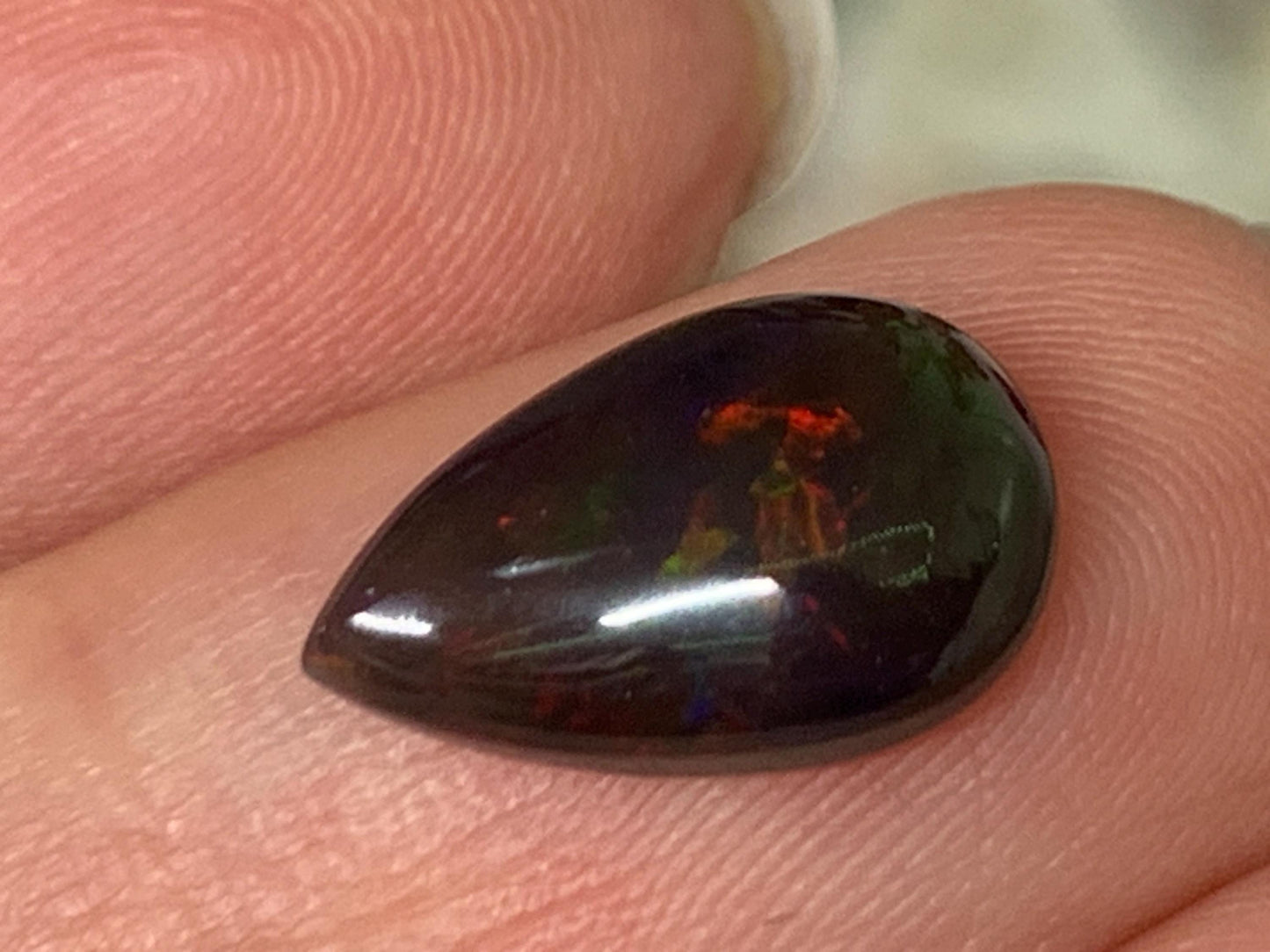 Natural Ethiopian Black Opal 8x13x4mm cabochon