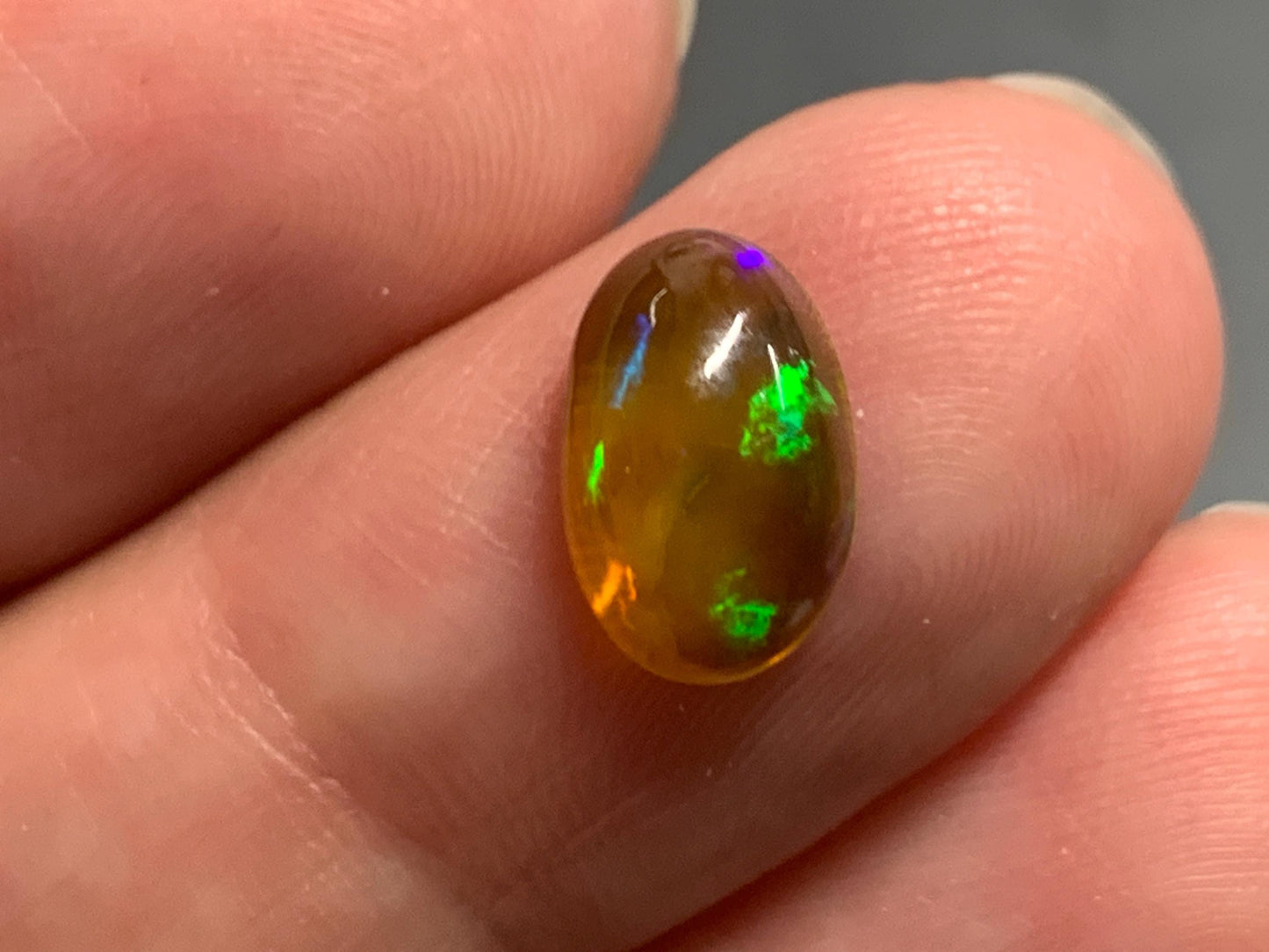 Natural Black Ethiopian Opal oval 6x10x4mm cabochon